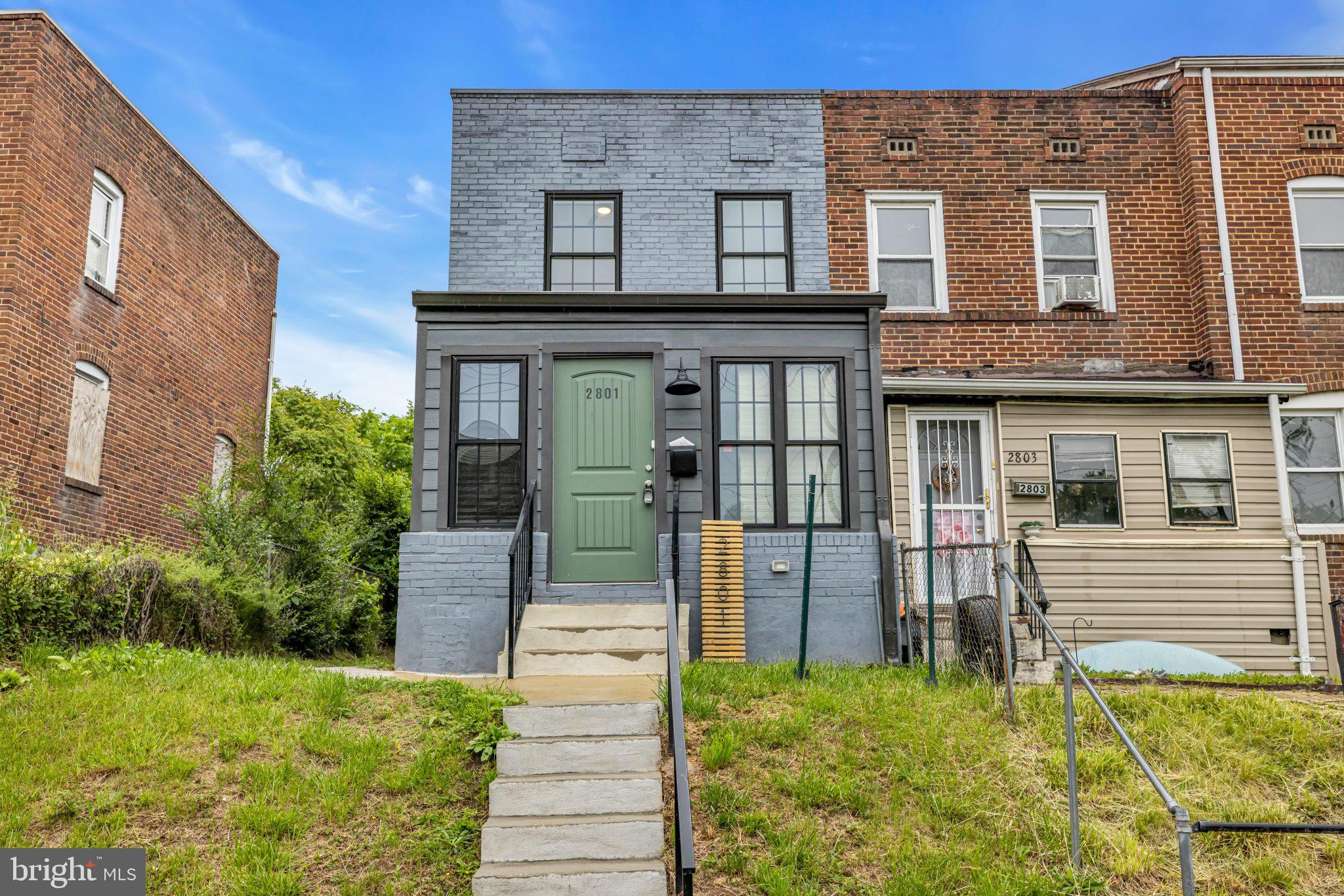 2801 Round Road Baltimore, MD 21225 - Photo 27 of 29 a front view of a house with a yard
