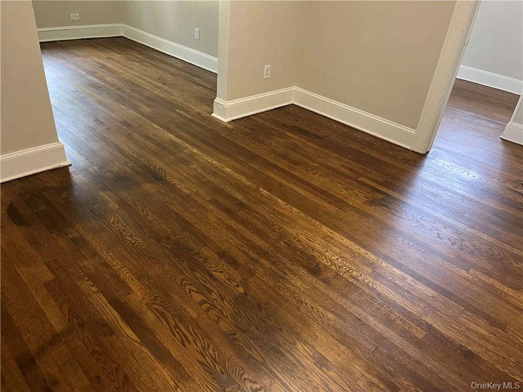 598 Highway 303 Blauvelt, NY 10913 - Photo 4 of 9 a view of wooden floor in an empty room