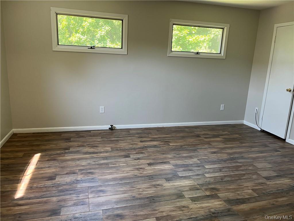 598 Highway 303 Blauvelt, NY 10913 - Photo 7 of 9 a view of a room with wooden floor and window