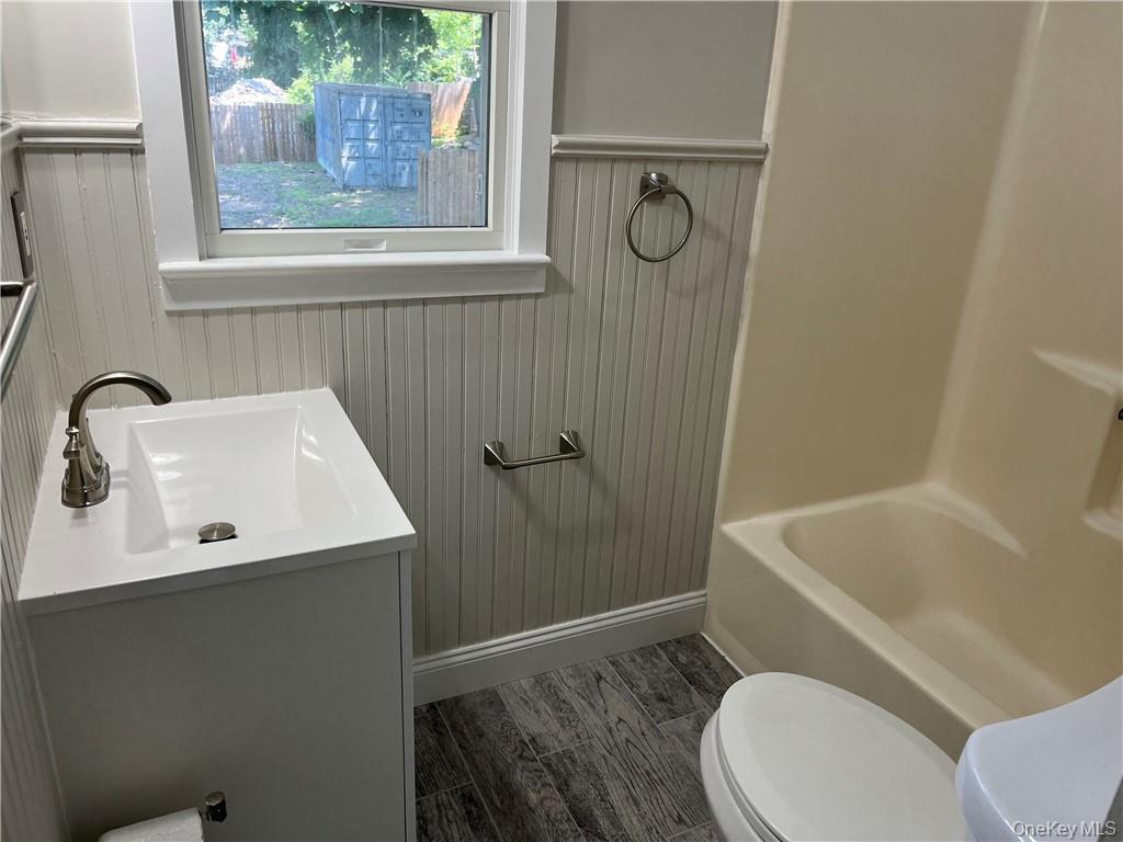 598 Highway 303 Blauvelt, NY 10913 - Photo 8 of 9 a bathroom with a sink a toilet and shower