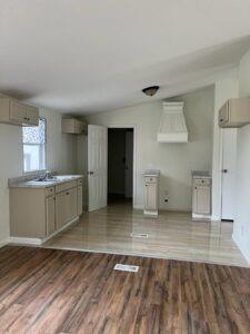44 Balladeer Corinth, TX 76210 - Photo 13 of 15 a view of a kitchen with wooden floor and a sink