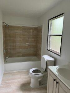 44 Balladeer Corinth, TX 76210 - Photo 15 of 15 a bathroom with a toilet a sink and bathtub