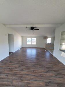 44 Balladeer Corinth, TX 76210 - Photo 6 of 15 a view of empty room with wooden floor and fan