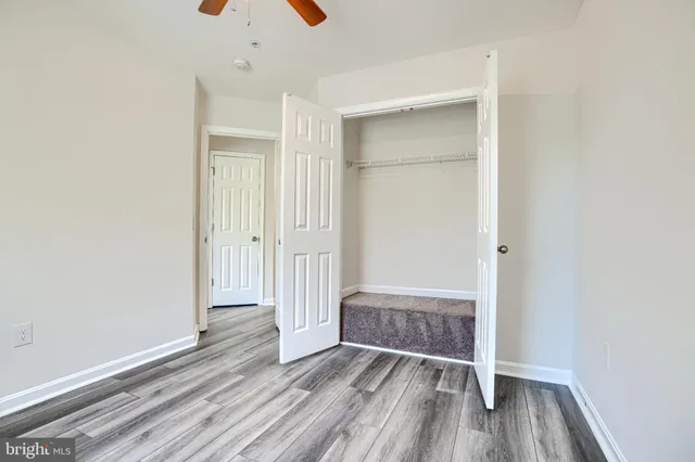 a view of entryway with wooden floor