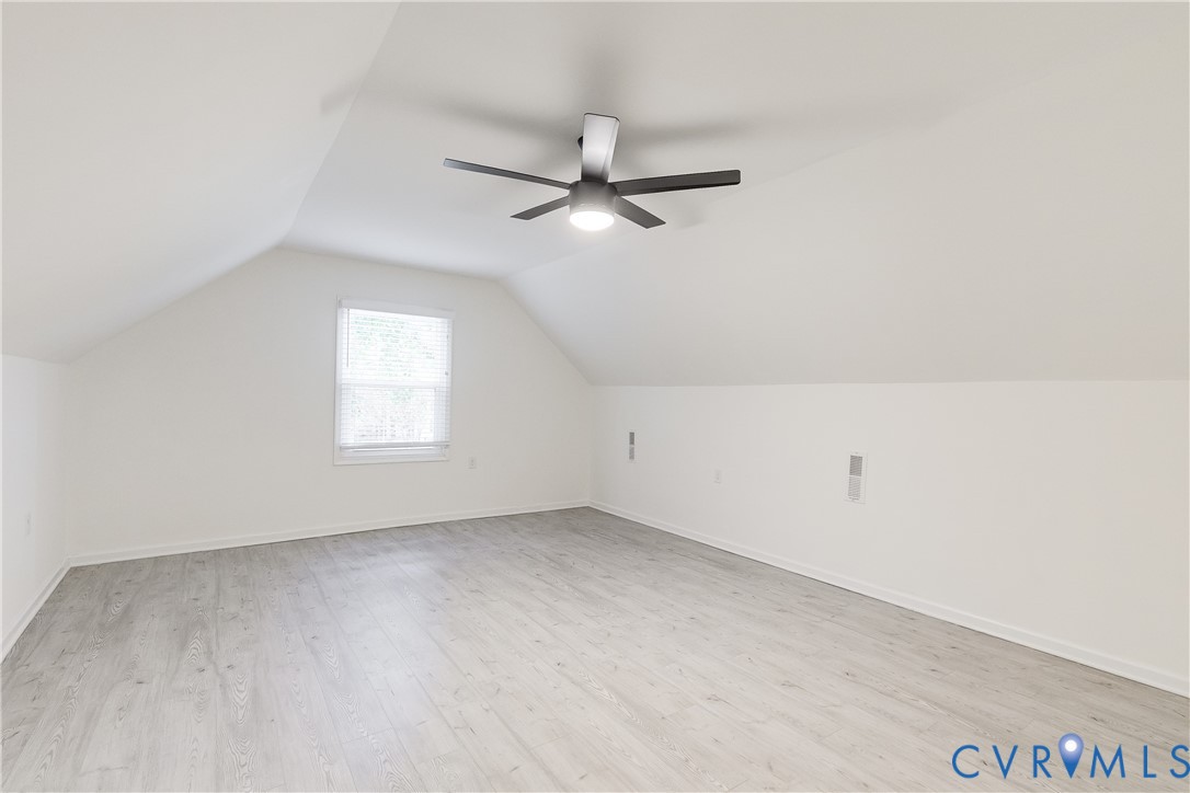 10008 Brittonwood Drive North Chesterfield, VA 23237 - Photo 16 of 34 an empty room with a window and ceiling fan