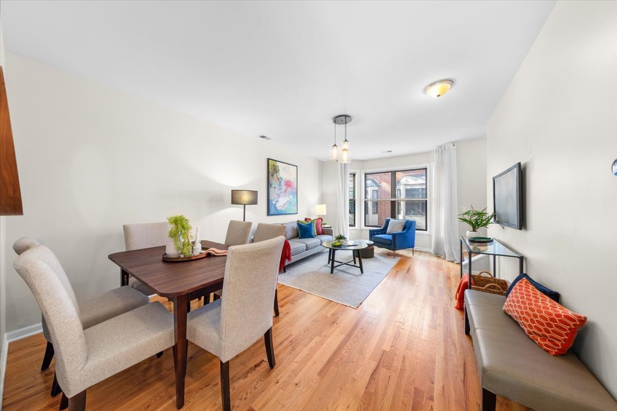 1802 North Spaulding Avenue Chicago, IL 60647 - Photo 12 of 28 a living room with furniture and a flat screen tv