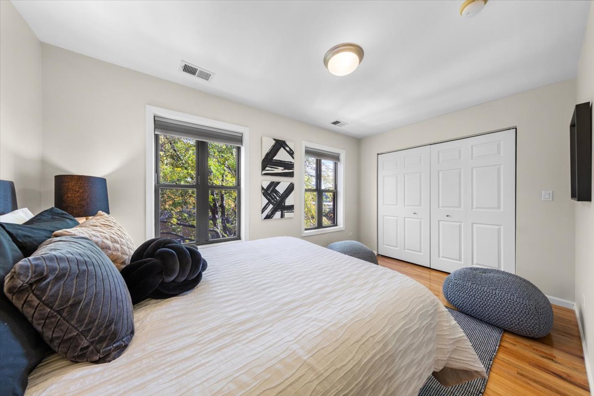 1802 North Spaulding Avenue Chicago, IL 60647 - Photo 20 of 28 a bedroom with a bed and window