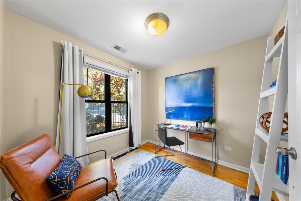 1802 North Spaulding Avenue Chicago, IL 60647 - Photo 24 of 28 a living room with furniture and a window