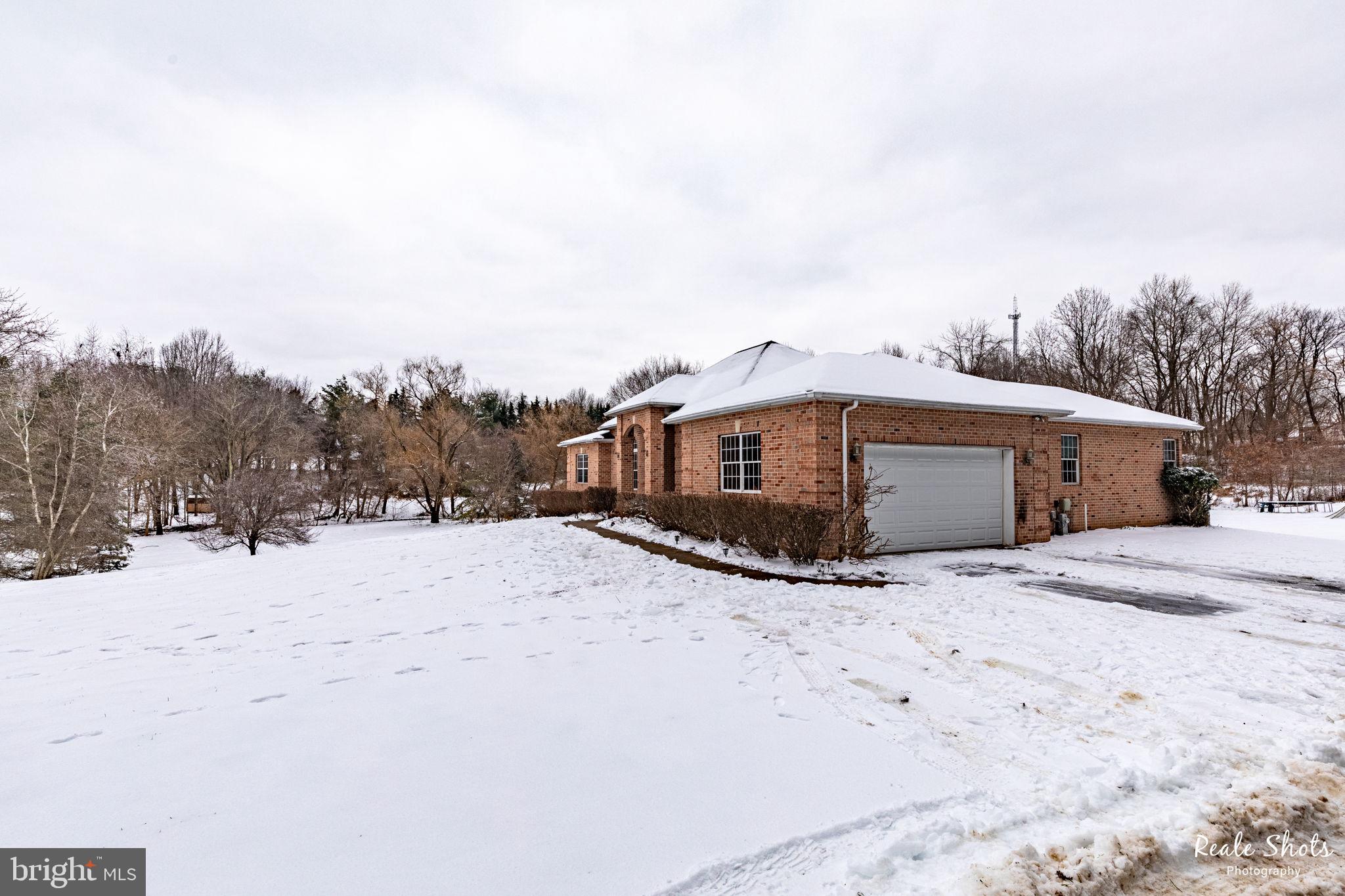 14217 Robcaste Road Phoenix, MD 21131 - Photo 47 of 54 Exterior Side w/two car garage