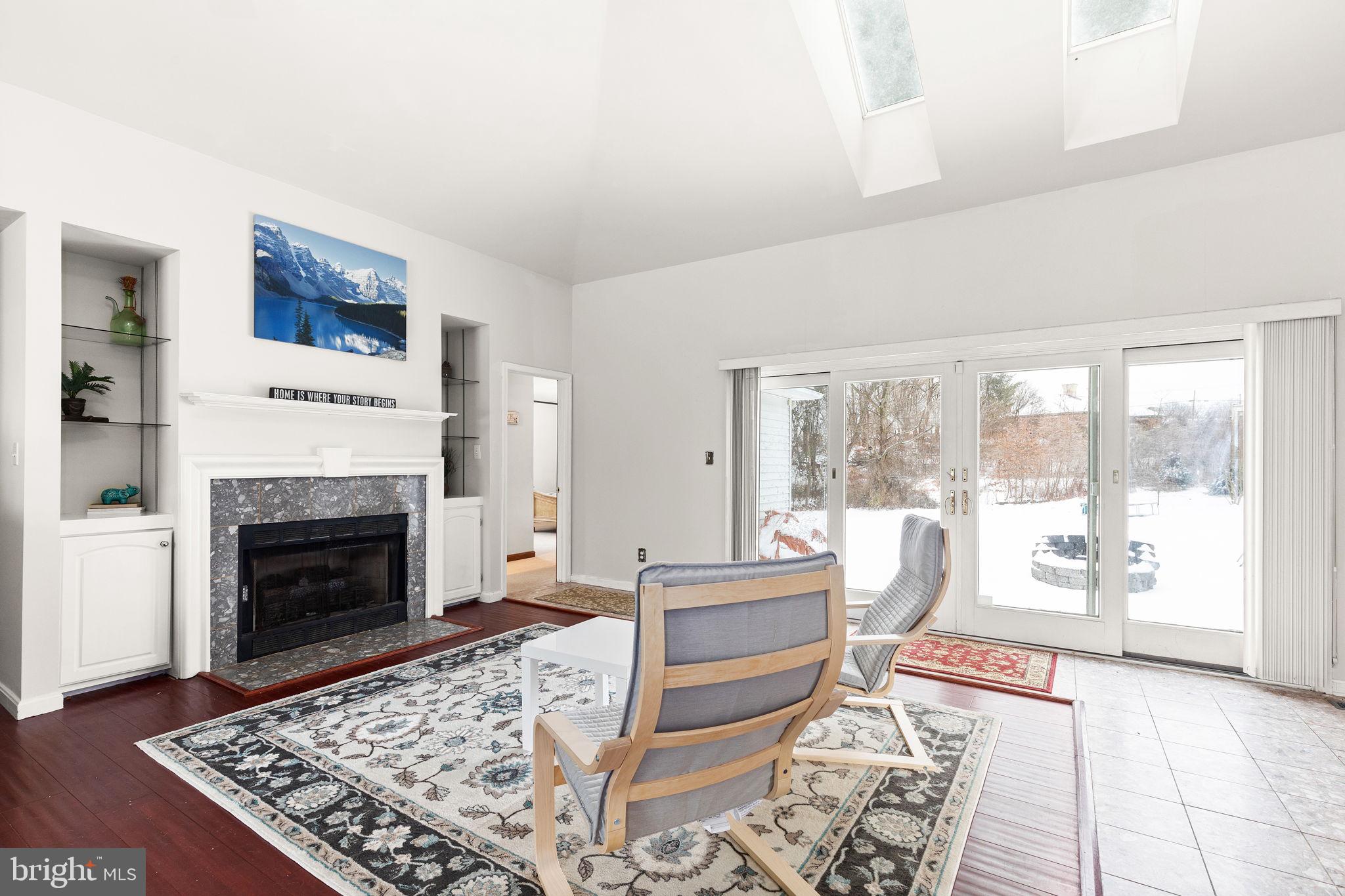 14217 Robcaste Road Phoenix, MD 21131 - Photo 9 of 54 Gas Fireplace in sitting area & Skylights
