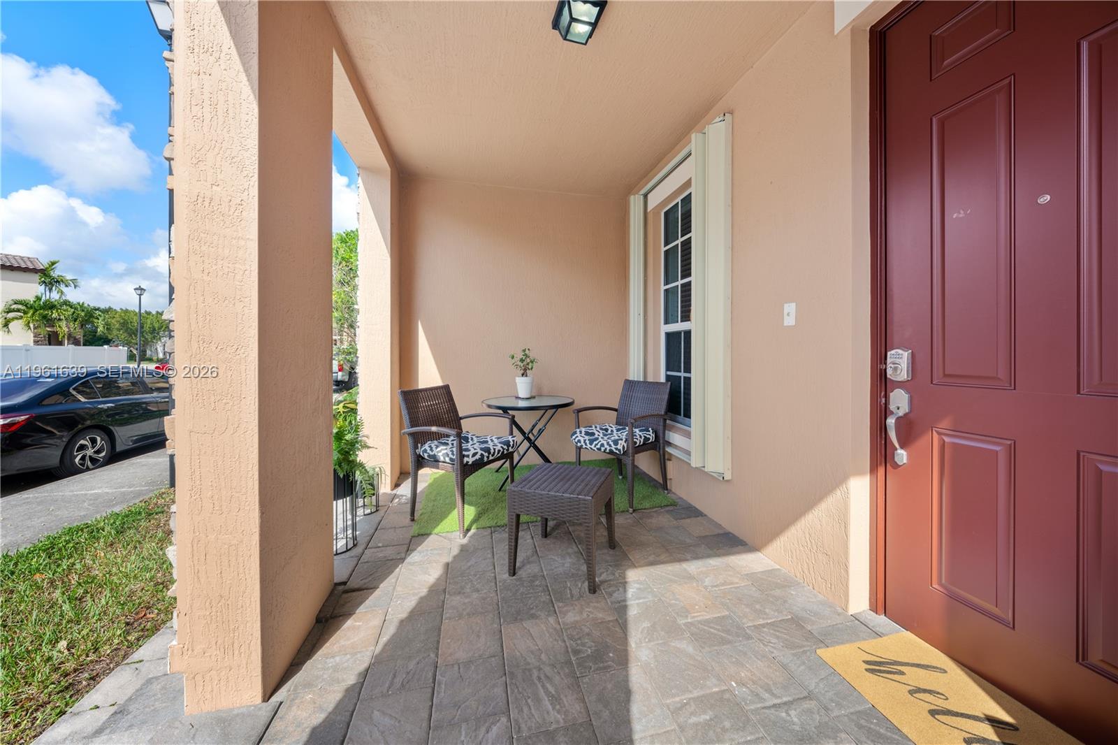 16958 Southwest 92nd Street, Unit 16958 Miami, FL 33196 - Photo 25 of 40 a view of balcony and patio