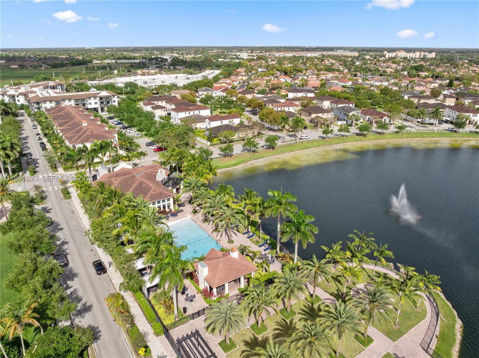 16958 Southwest 92nd Street, Unit 16958 Miami, FL 33196 - Photo 40 of 40 an aerial view of residential houses with outdoor space and lake view