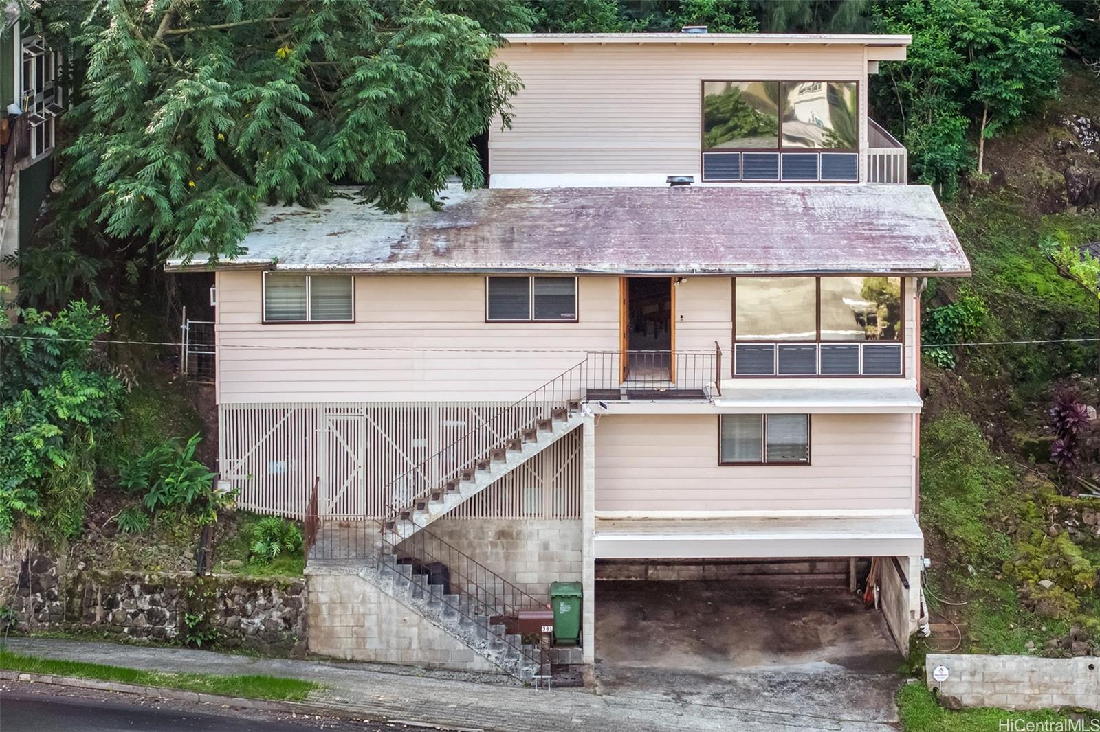 381 Puiwa Road Honolulu, HI 96817 - Photo 2 of 24 Finished basement above the carport, main level above that, and flex space on top.