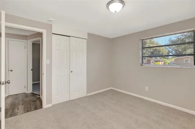 a view of livingroom with furniture and window