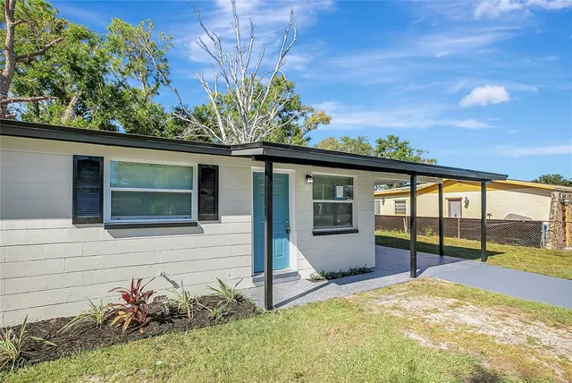 front view of a house with a big yard