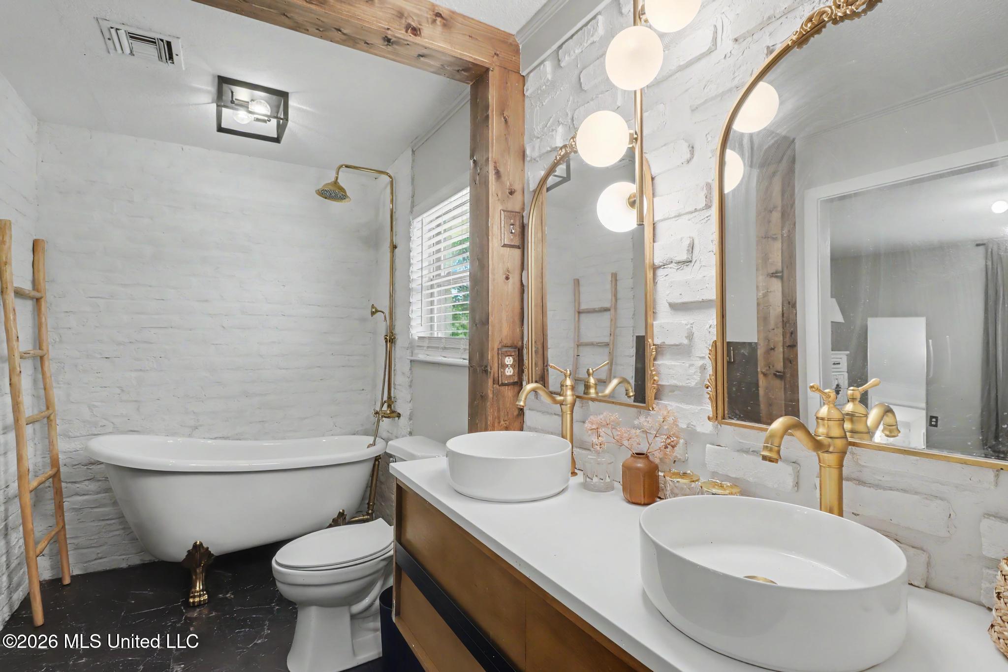 17074 Doc Lizana Road Gulfport, MS 39503 - Photo 13 of 32 main bathroom