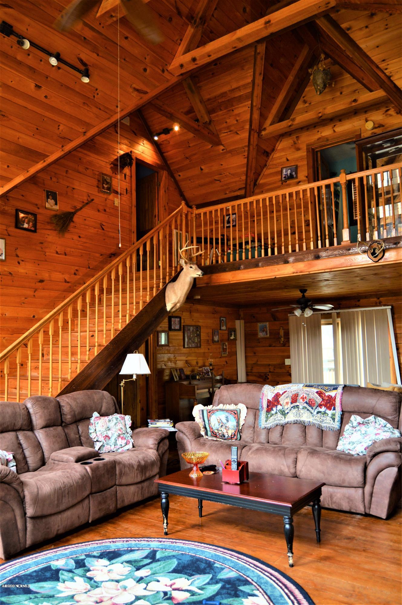 605 Pelham Road Willard, NC 28478 - Photo 9 of 42 ceiling from living