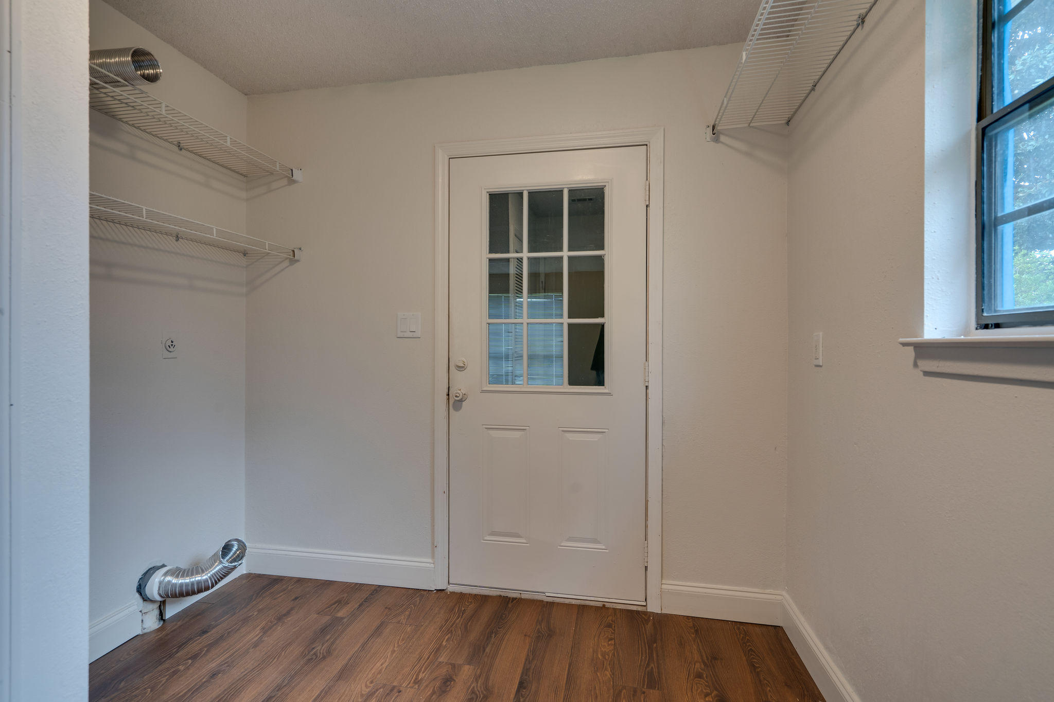 409 Juniper Street Destin, FL 32541 - Photo 15 of 32 wooden floor in an empty room