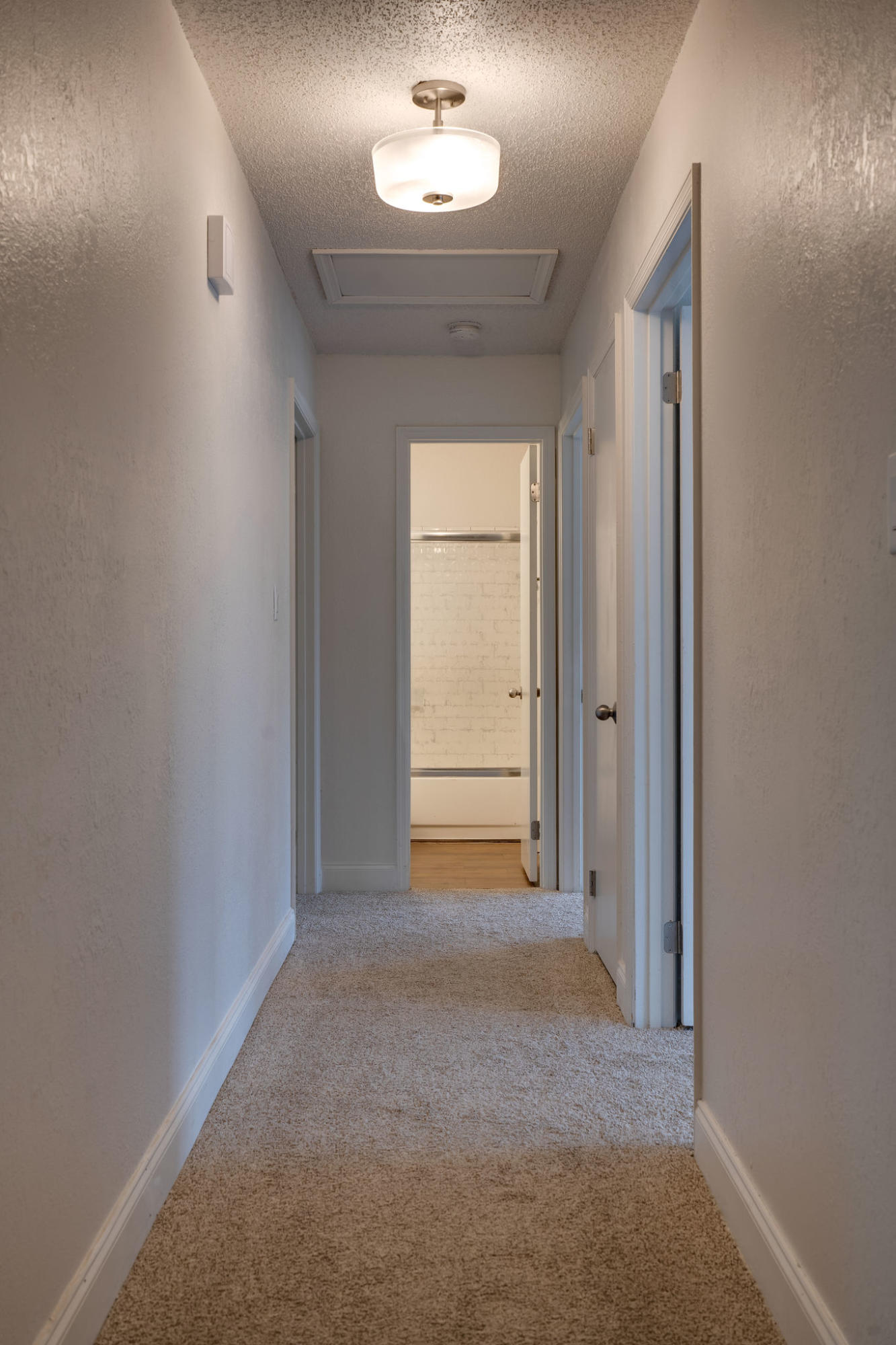 409 Juniper Street Destin, FL 32541 - Photo 17 of 32 an empty room with a window and a ceiling fan