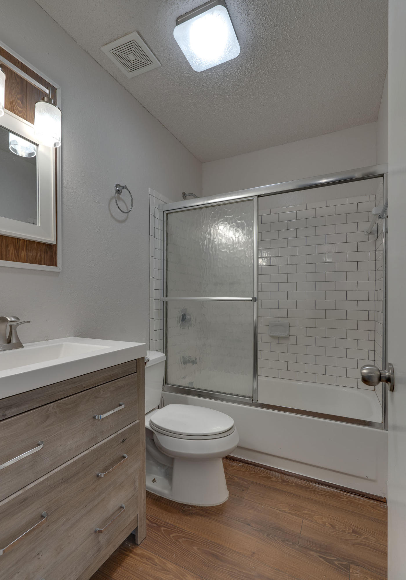 409 Juniper Street Destin, FL 32541 - Photo 20 of 32 a bathroom with a toilet a sink and shower