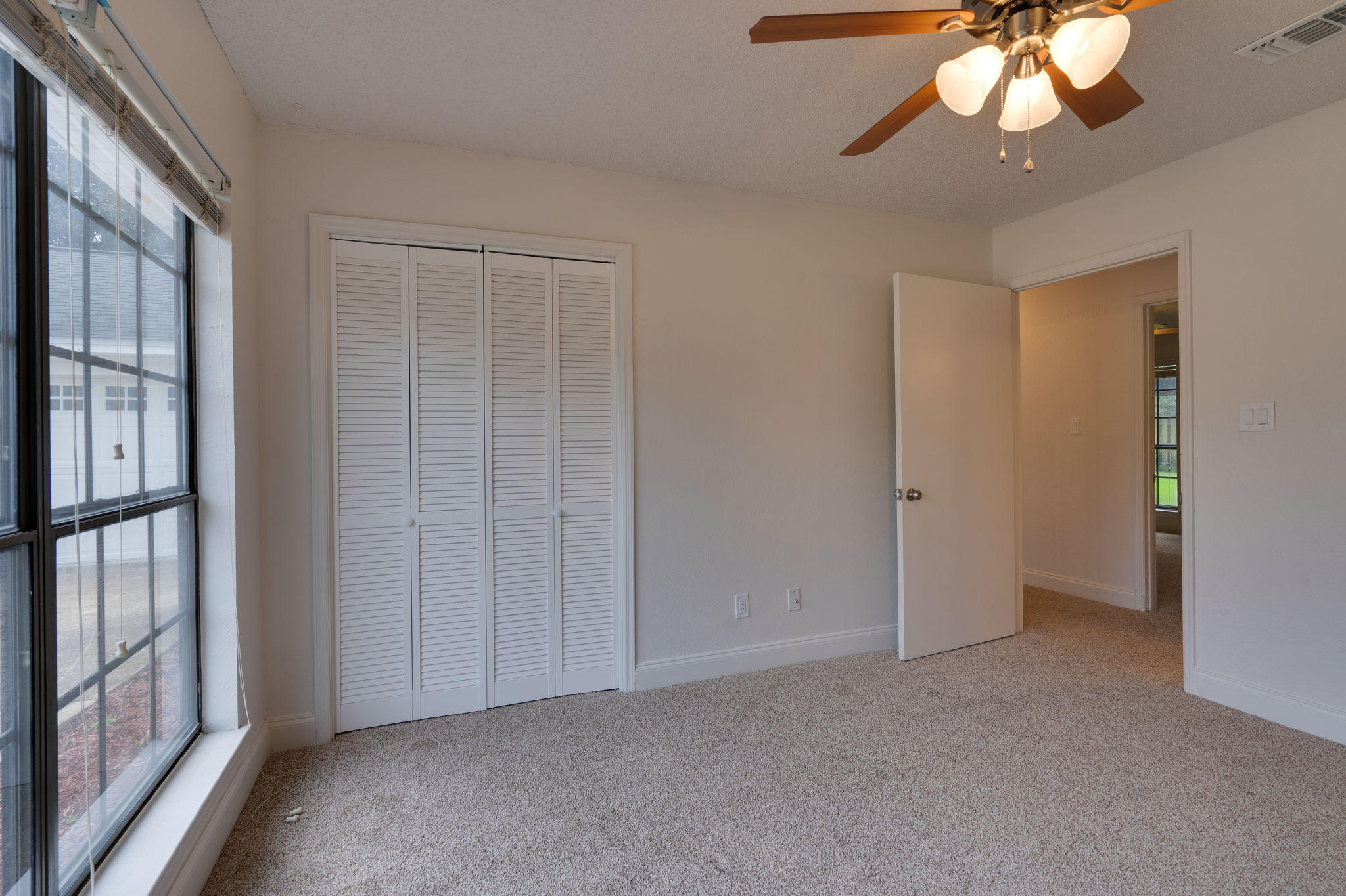 409 Juniper Street Destin, FL 32541 - Photo 22 of 32 a view of an empty room with a window