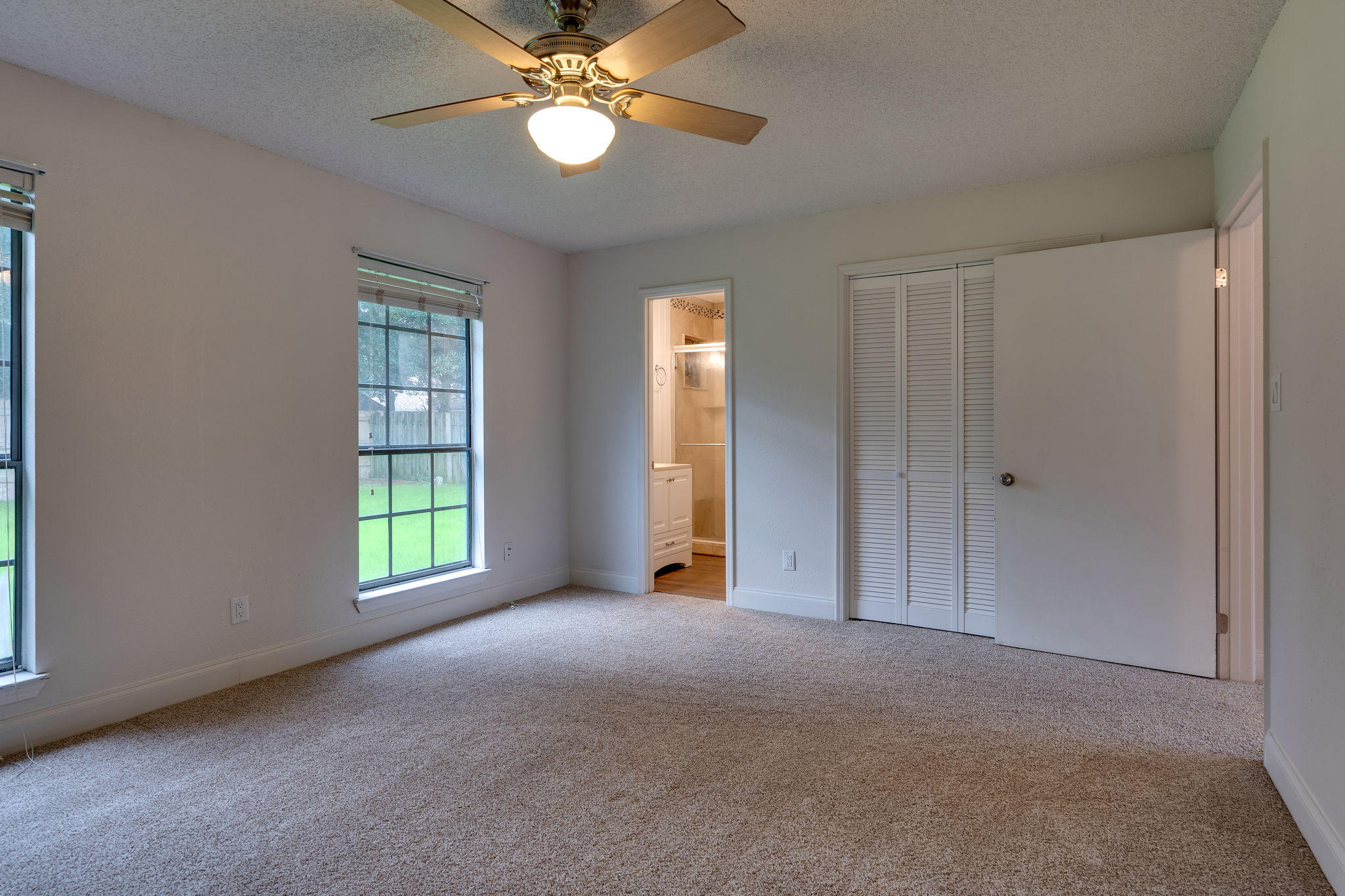 409 Juniper Street Destin, FL 32541 - Photo 24 of 32 a view of an empty room with a window