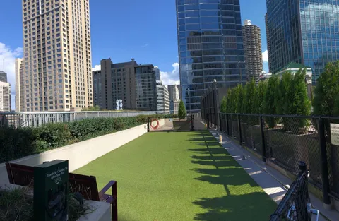 a view of a city with tall buildings