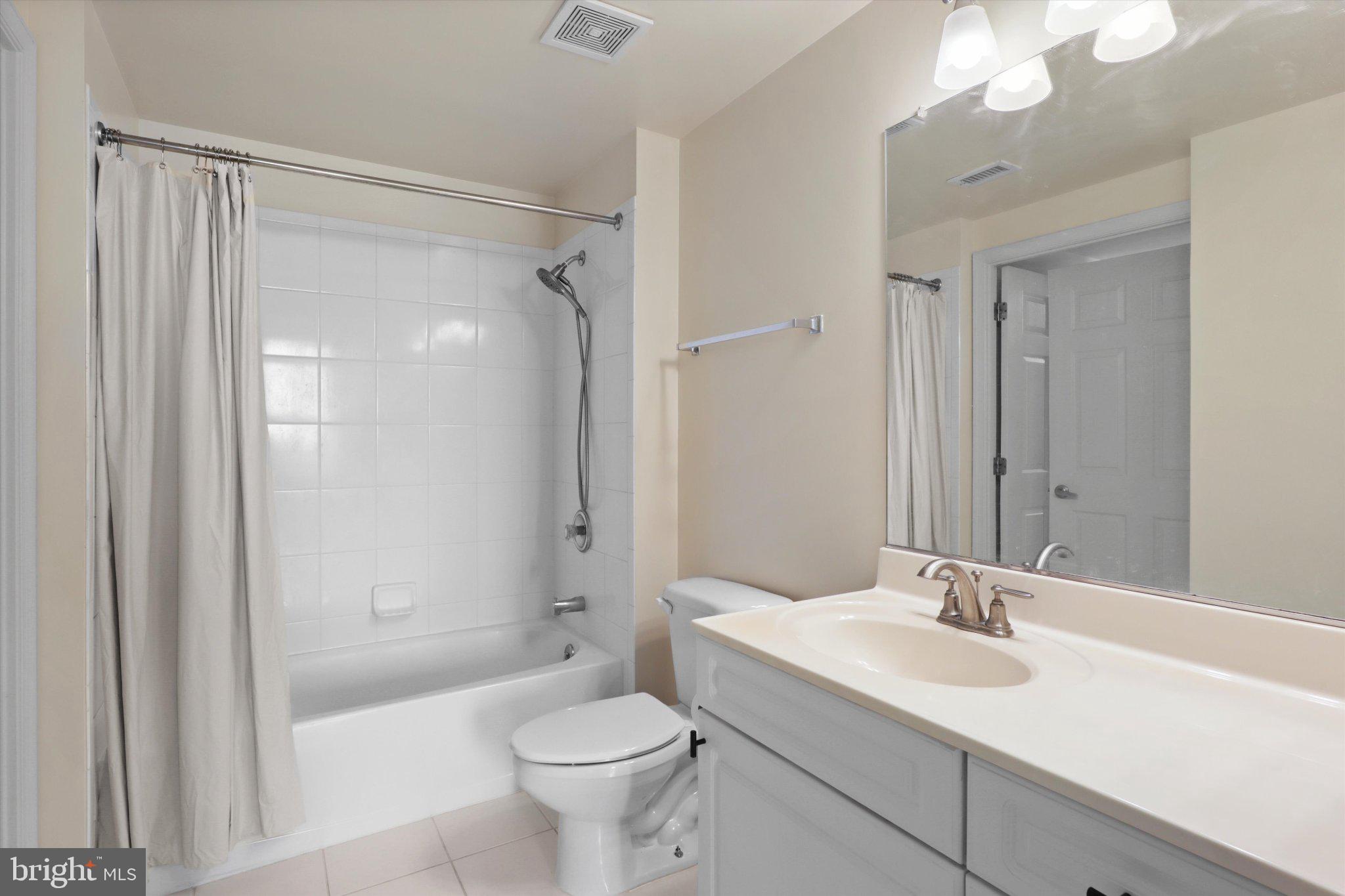 2726 Gallows Road, Unit 1506 Vienna, VA 22180 - Photo 16 of 35 Modern bathroom with sleek finishes.