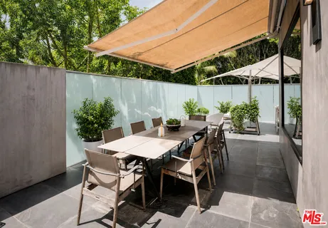 a patio view with a seating space