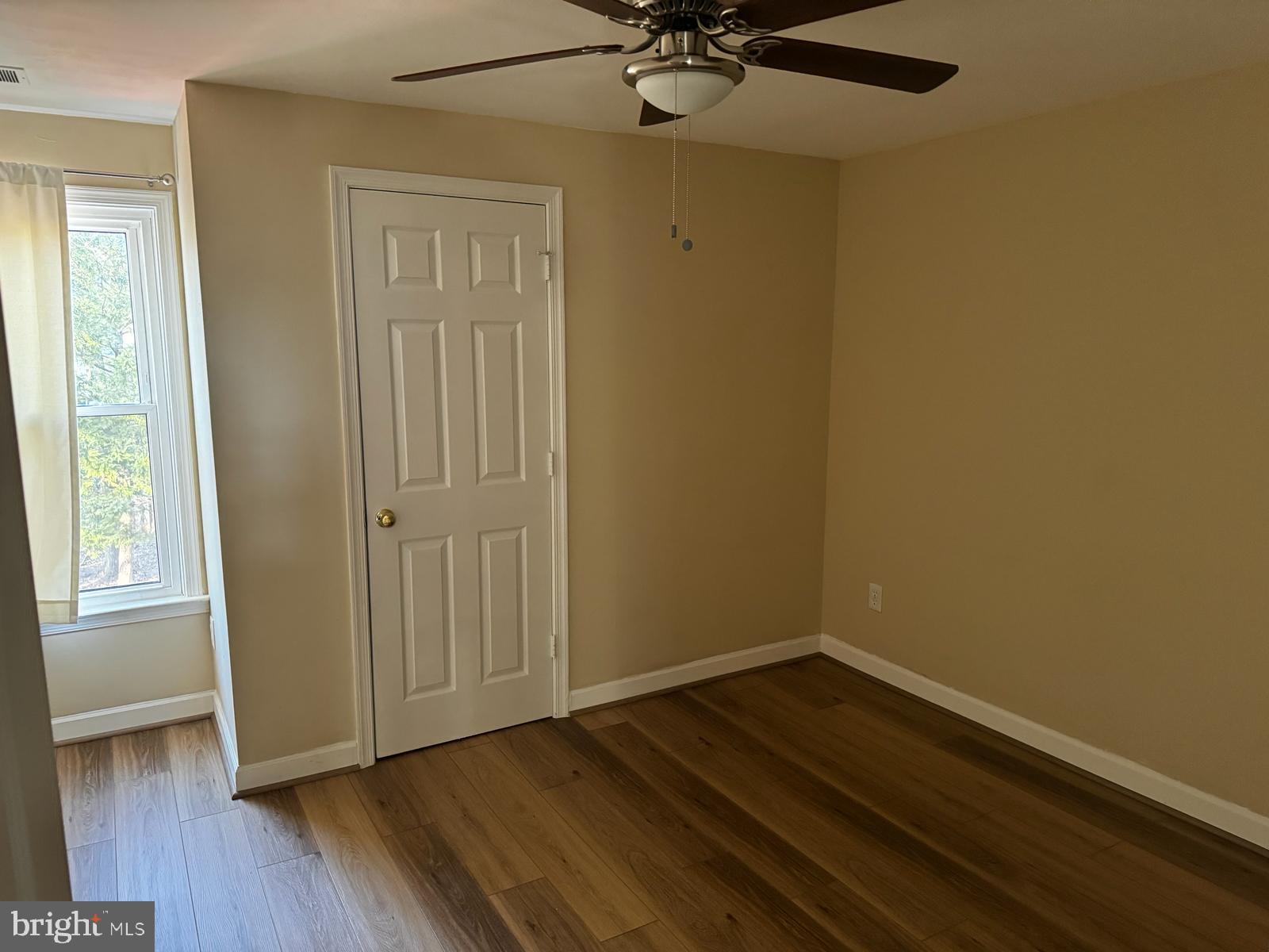 21131 Crocus Terrace Ashburn, VA 20147 - Photo 13 of 37 a view of a room with wooden floor and cabinet