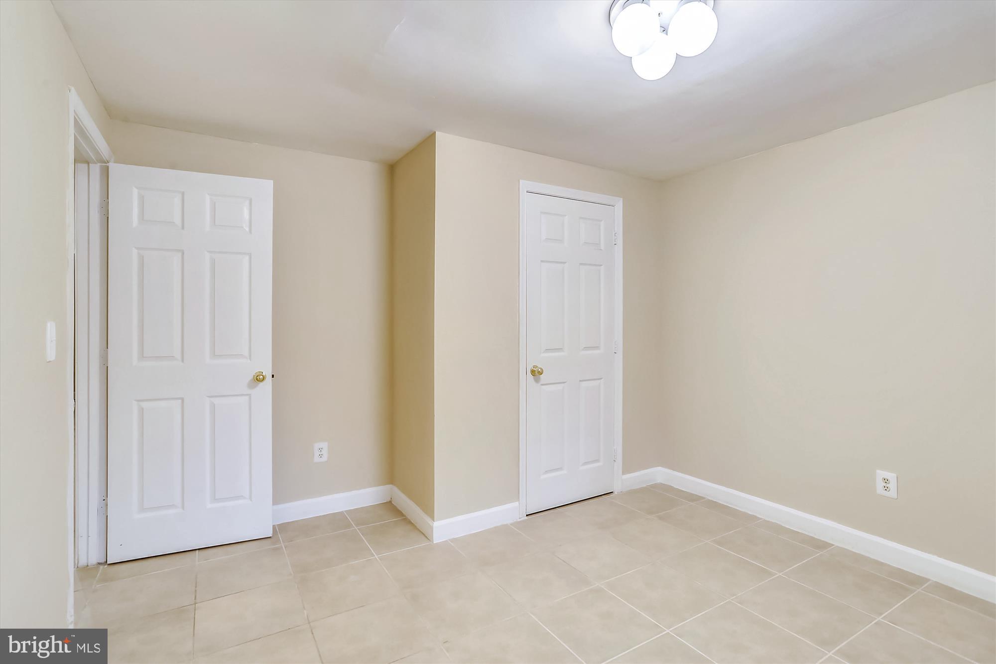 21131 Crocus Terrace Ashburn, VA 20147 - Photo 5 of 37 a view of an empty room and chandelier fan