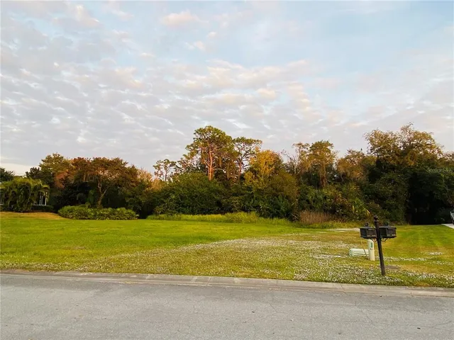 a view of a swimming pool with an ocean view