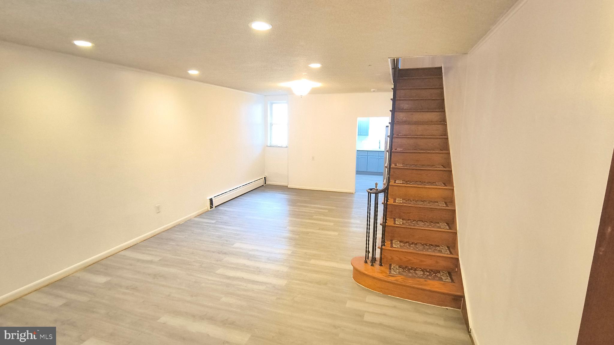 2702 South 18th Street Philadelphia, PA 19145 - Photo 8 of 30 a view of entryway with wooden floor