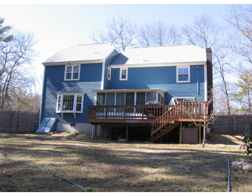 22 Bennett Road Rochester, MA 02770 - Photo 3 of 4 a front view of a house with a yard