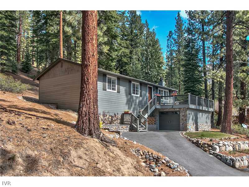 844 Jeffrey Street Incline Village, NV 89451 - Photo 3 of 17 a backyard of a house with barbeque oven and outdoor seating