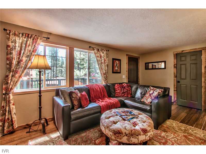 844 Jeffrey Street Incline Village, NV 89451 - Photo 4 of 17 a living room with furniture and a large window