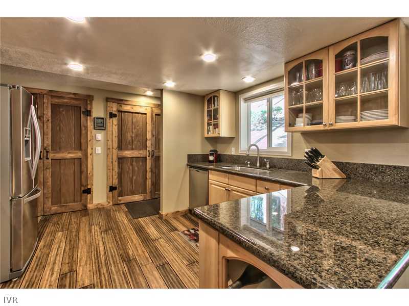 844 Jeffrey Street Incline Village, NV 89451 - Photo 7 of 17 a kitchen view with wooden floor and a refrigerator