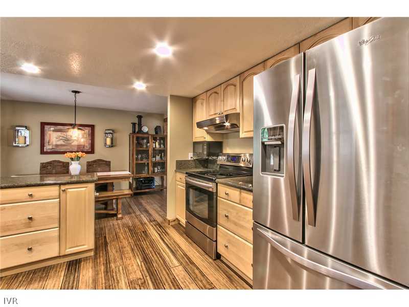 844 Jeffrey Street Incline Village, NV 89451 - Photo 8 of 17 a kitchen with stainless steel appliances a refrigerator and a stove top oven