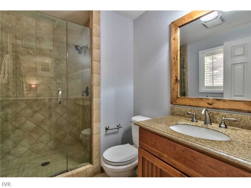 844 Jeffrey Street Incline Village, NV 89451 - Photo 10 of 17 a bathroom with a granite countertop sink toilet and shower