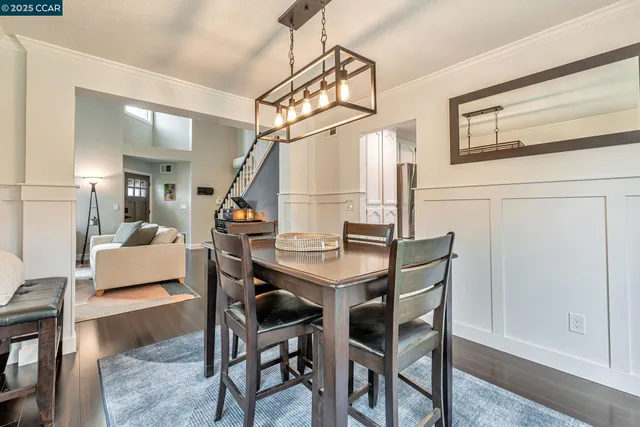 a dinning room with furniture and a table