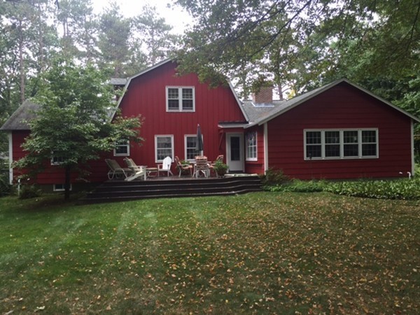 130 Hidden Road Andover, MA 01810 - Photo 3 of 27 a front view of a house with garden