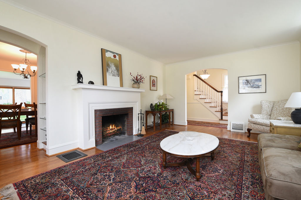 4620 Wolf Road Western Springs, IL 60558 - Photo 3 of 20 a living room with furniture and a fireplace
