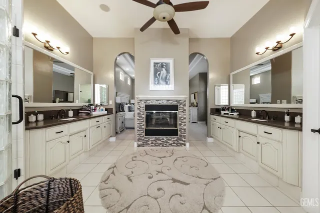 a bathroom with a shower and a window