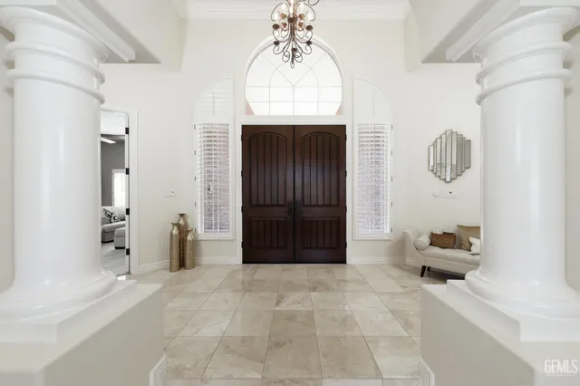 a view of room with entryway and hallway