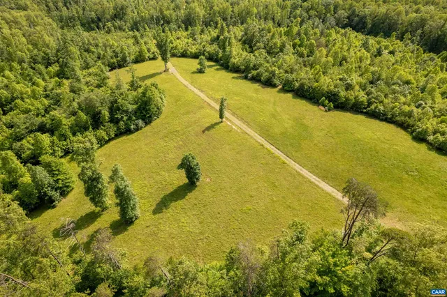 a view of a pool in a yard