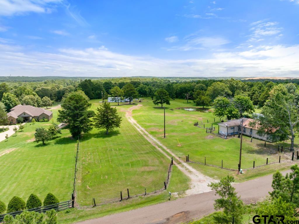 5353 County Road 385 Tyler, TX 75708 - Photo 6 of 28 a view of a swimming pool and a yard