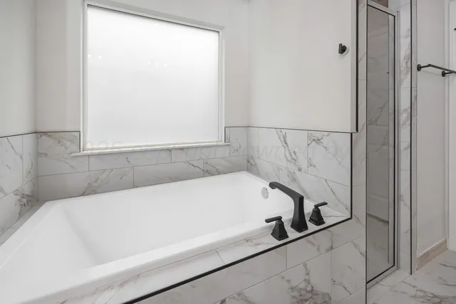 a bathroom with a bathtub