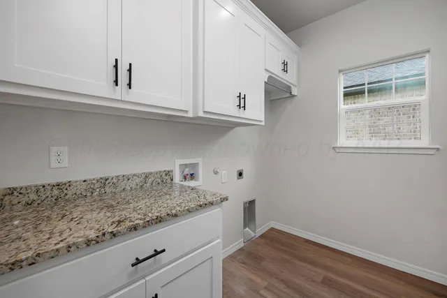 a view white cabinets and a window