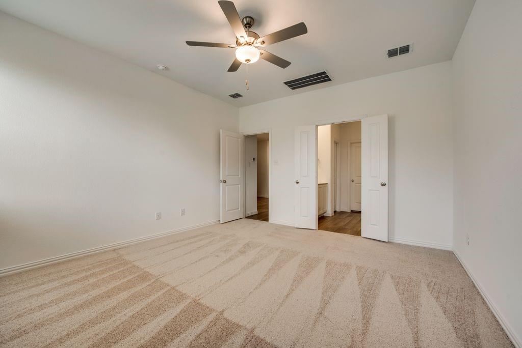 204 Coconut Drive Azle, TX 76020 - Photo 15 of 20 a view of a big room with carpet