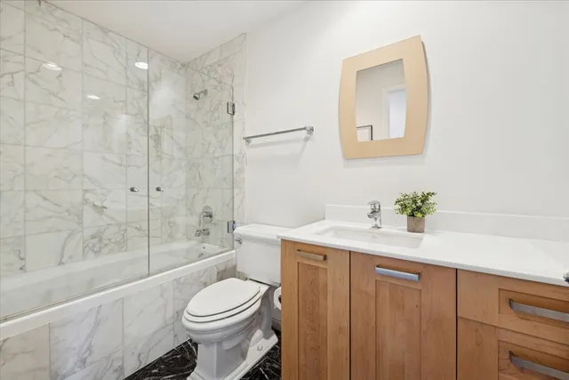 a view of a hallway with washer and dryer